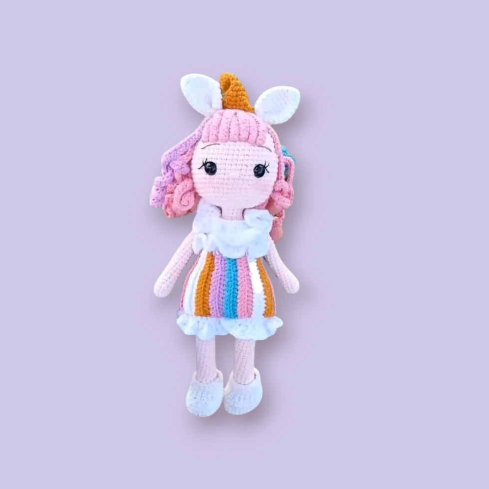 Adorable Unicorn doll in Rainbow Dress