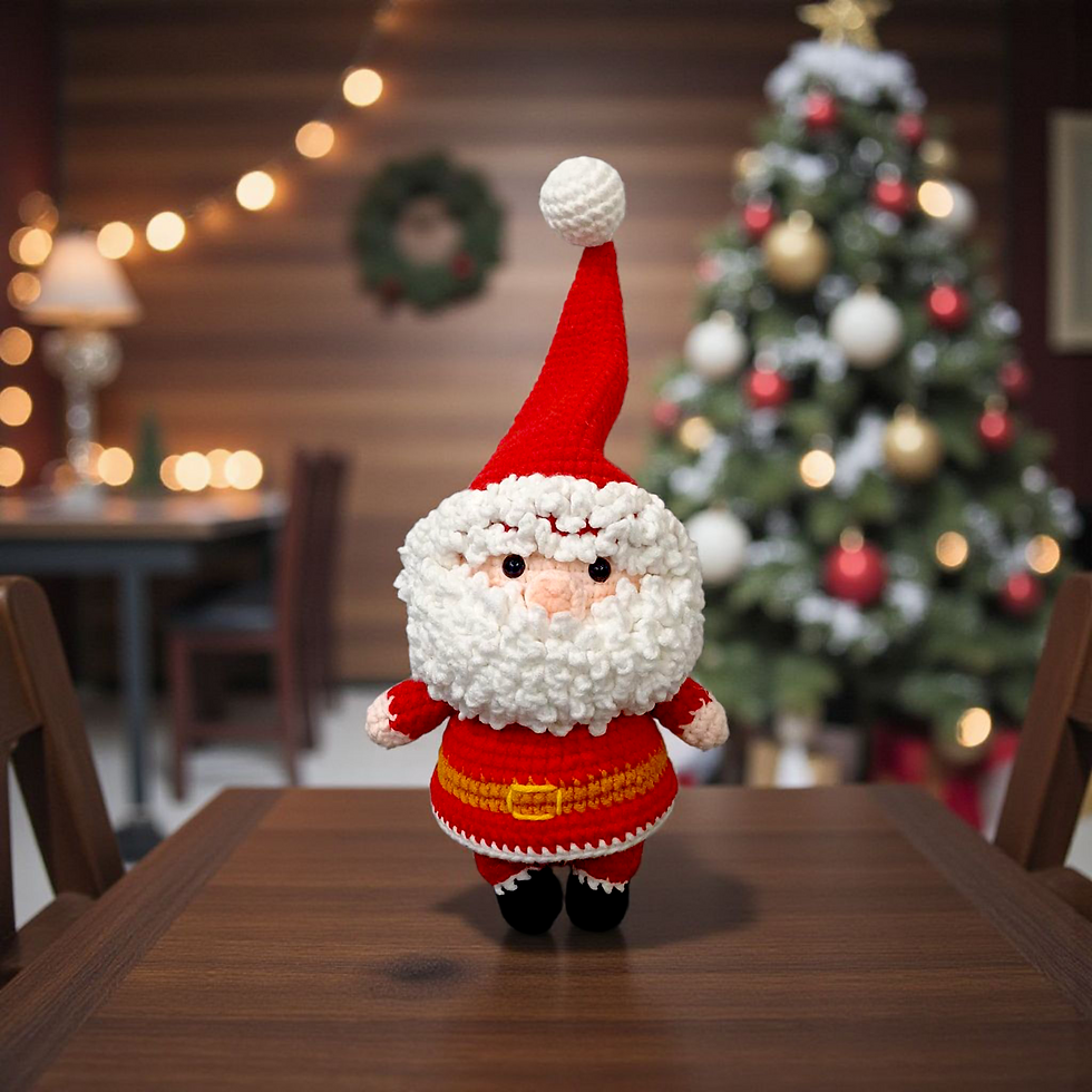 Front view of handmade crochet Santa Claus doll with red suit, fluffy white beard, tall hat and black boots.