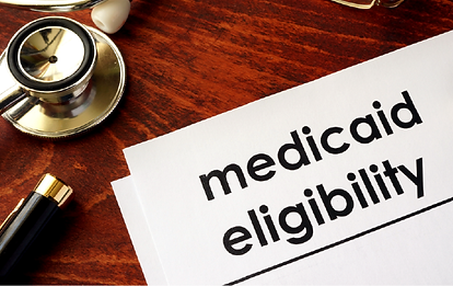 Medicaid eligibility papers on desk