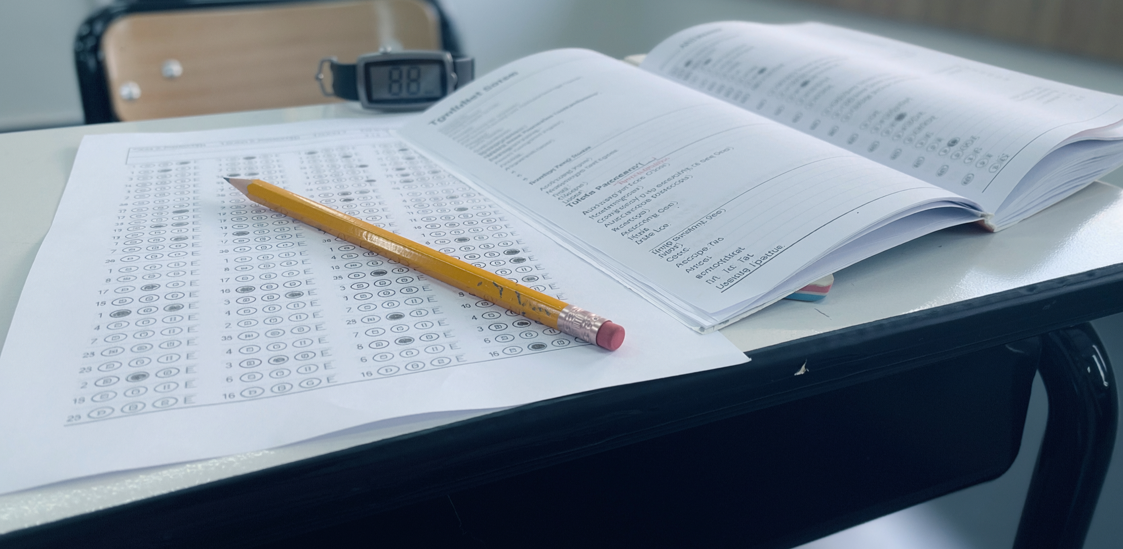 Test preparation book with a pencil