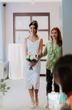 bride walking down the aisle at toronto wedding chapel