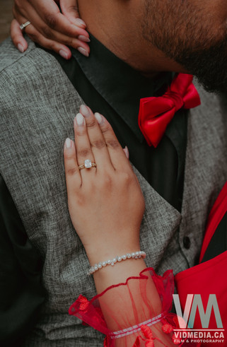 close up ring hand on grooms chest elora mills