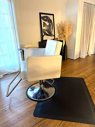 Interior view of Element Hair Studio with salon chair and station in Oxford near Ole Miss