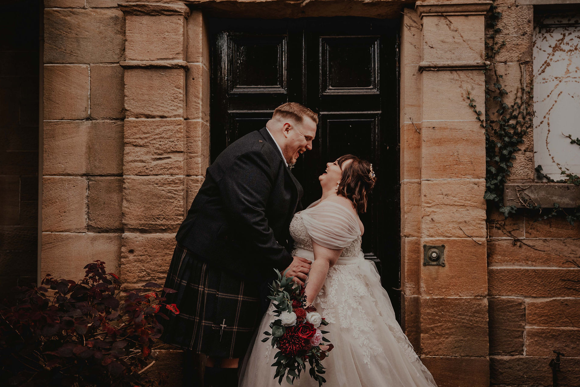 A kiss between a Scottish Groom and Bride