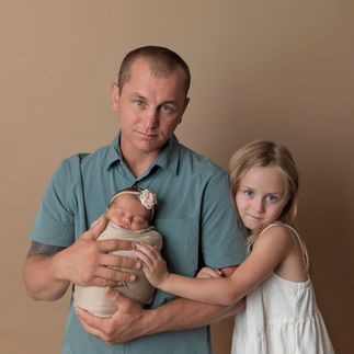 newborn in a blue wrap by Easley SC Newborn Photographer