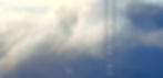 Beautiful woman on a ladder above the clouds looking far away_edited_edited_edited_edited.