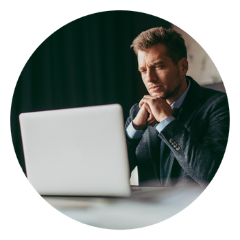 Business leader reviewing IT challenges, supported by secure managed IT services in Florida & Georgia