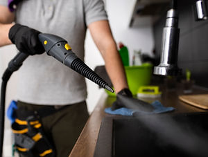 man-doing-professional-home-cleaning-service.jpg