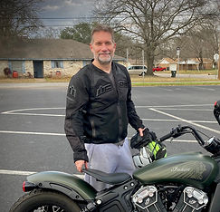 Rider Coach Gary Day with his motorcycle