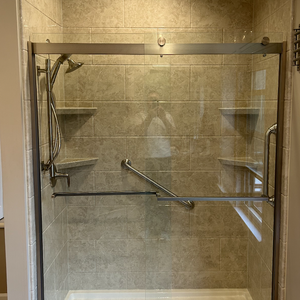 Modern Tiled Shower with Glass Doors