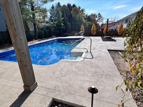 Concrete pool deck installed in Columbus, Ohio by Hacker’s Concrete Impressions