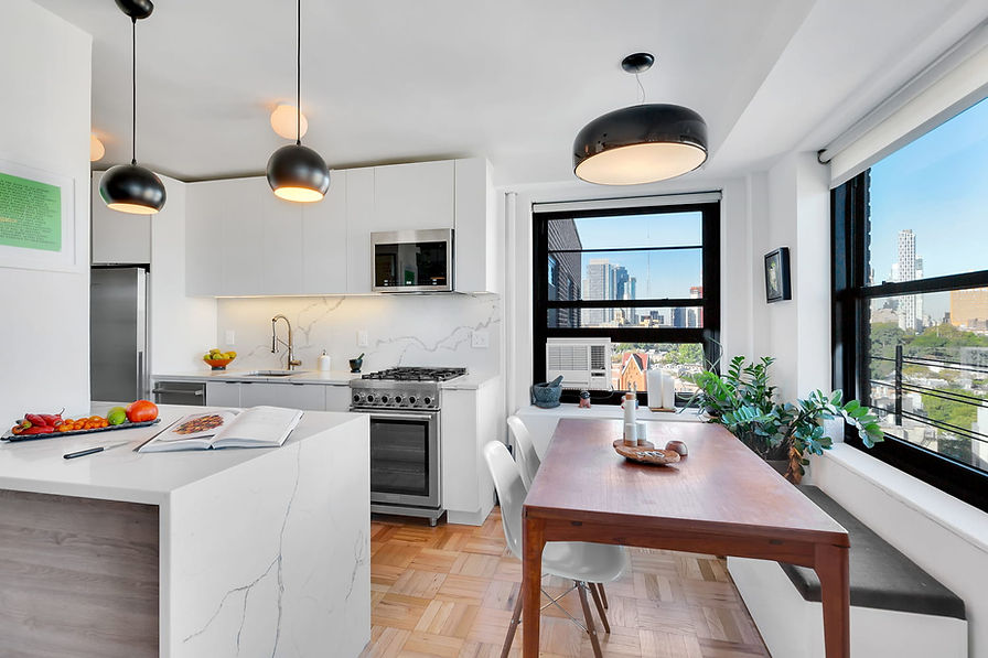 A gorgeous kitchen with a dining table.