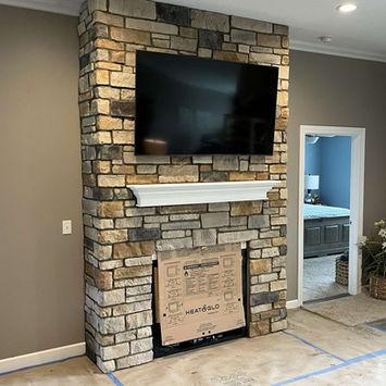 We installed cultured stone to this customer's fireplace to enhance the beauty and value.