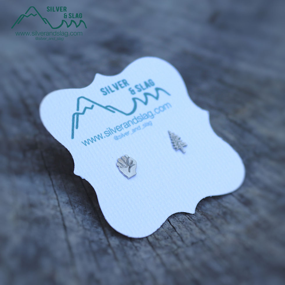 Thumbnail: RESIST Sterling Silver Mismatched Stud Earrings - Tree & Fist