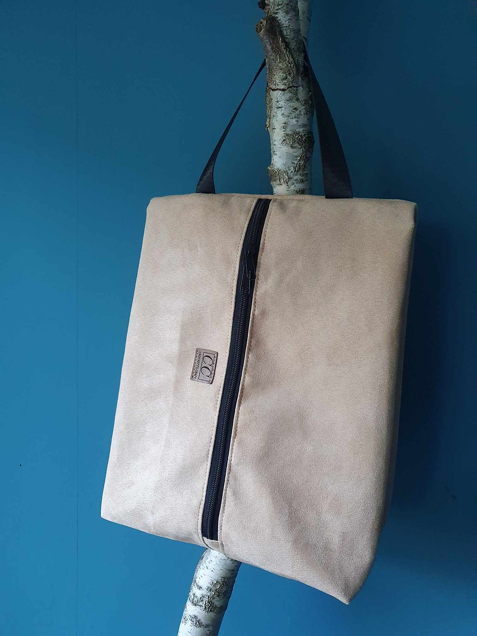 Miniaturbild: Tasche hängend