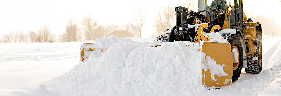yellow snow plow cleaning a road.jpg