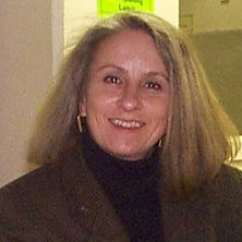 Kilbourne Lynda with pen (2).jpg