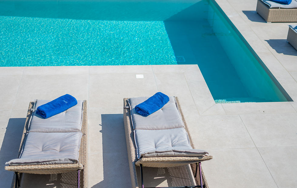 sunbeds and swimming pool