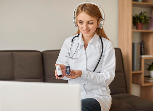 front-view-smiley-covid-recovery-center-female-doctor-with-headphones-holding-oximeter.jpg