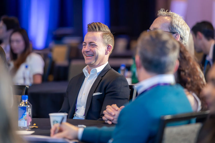 Executive attending a business conference session