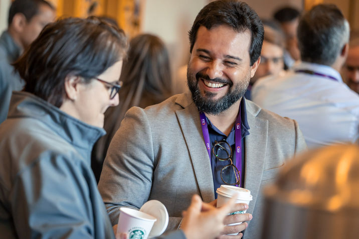 Attendees networking at a corporate event