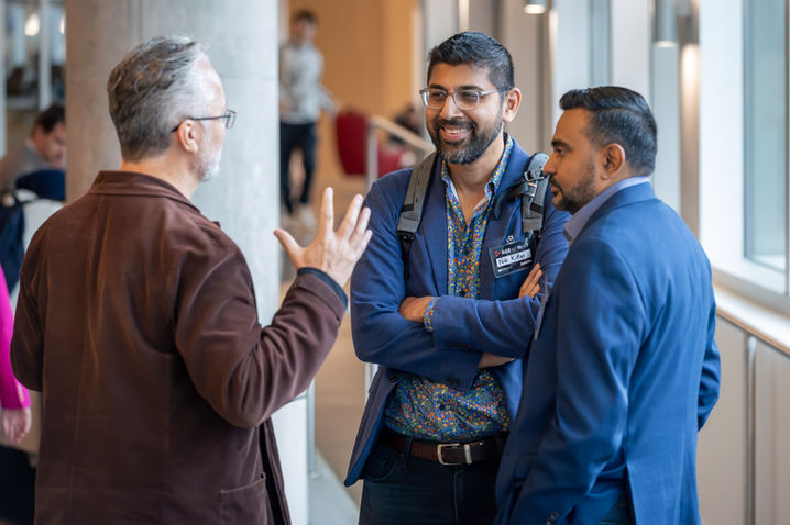 Professionals networking during a corporate conference