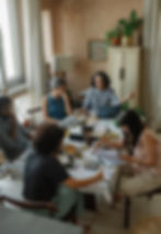 The co-founders of Terra Commons in focus as they work alongside.