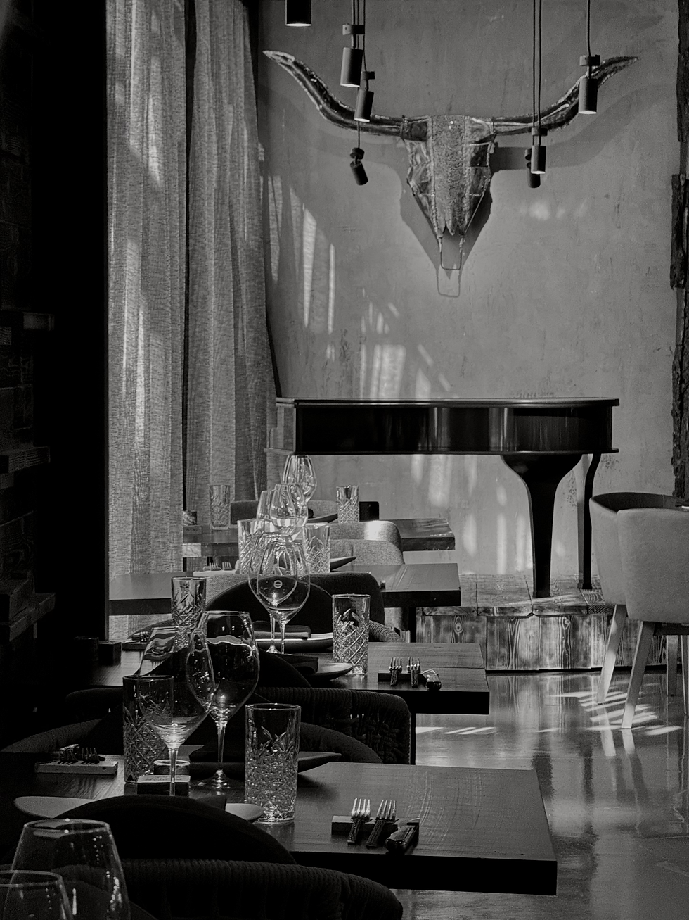 Live piano performance at Origen Steakhouse in Gilbert, AZ, creating an elegant and inviting ambience for Thursday Piano Nights.
