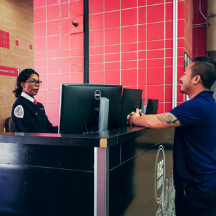 Ramp A lobby security desk with man talking to female security guard