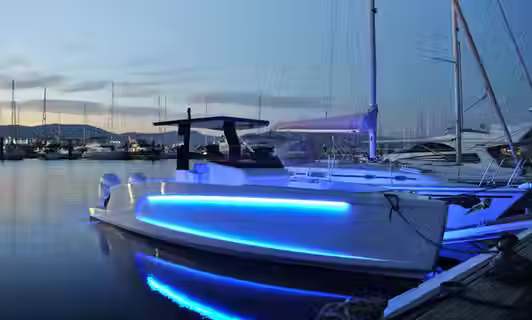 Blue lit yacht in the evening