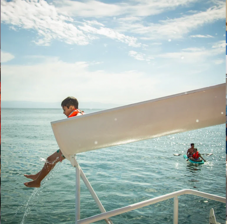 kid sliding down from a actaamran