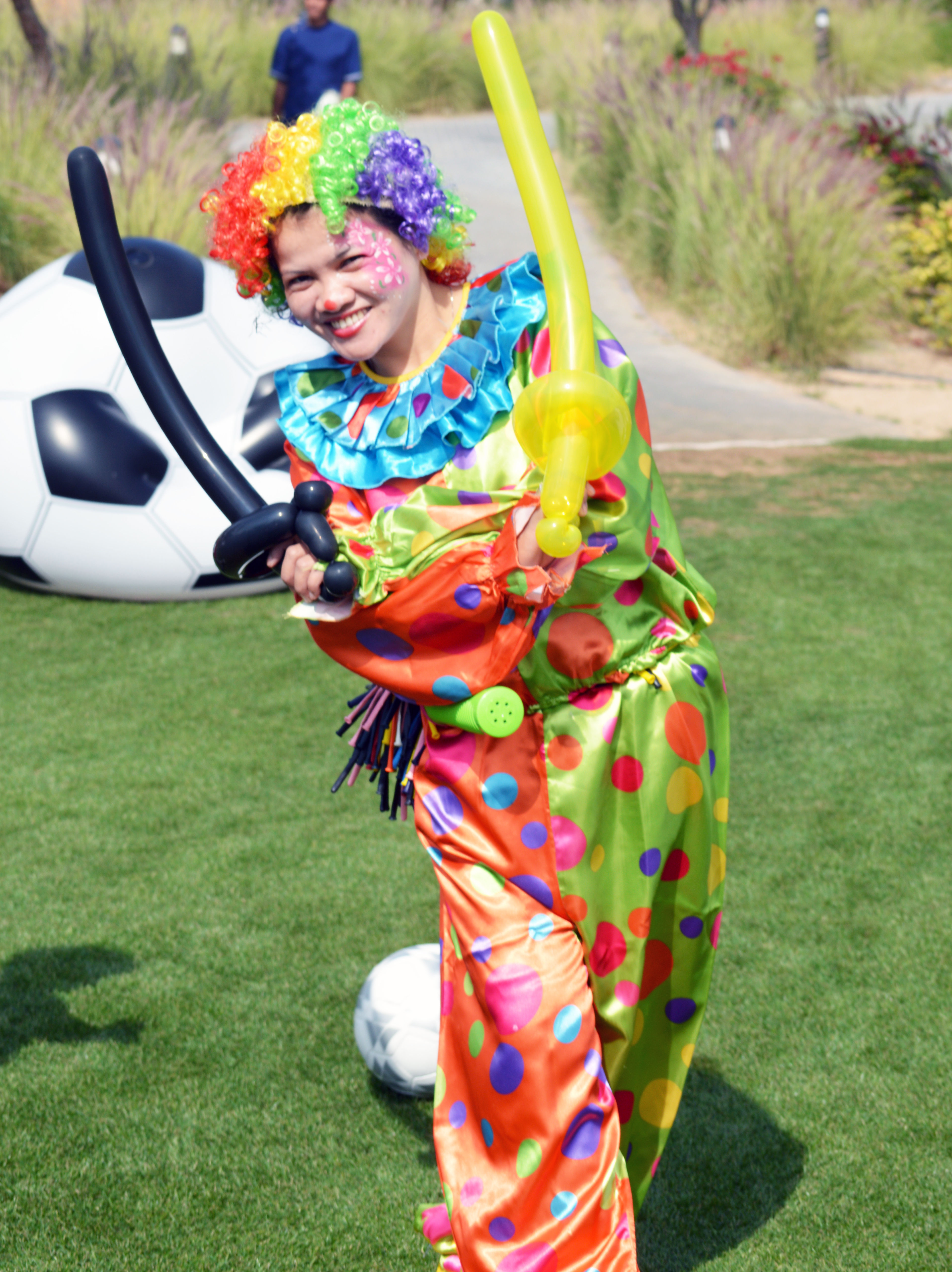 Balloon Twisting in Clown Costume