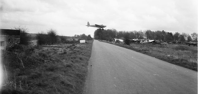 Plane flying at Aston down