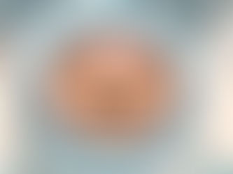 A robot with skull emojis as eyes and a skull boney mouth.