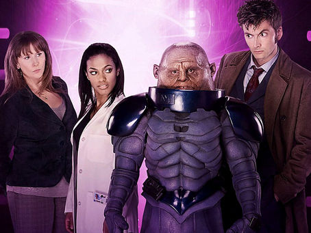 Promo shot for episodes, Donna, Martha and the Doctor all looking at a Sontaran