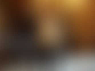 Clara, arms by side, stood in street with Doctor watching on