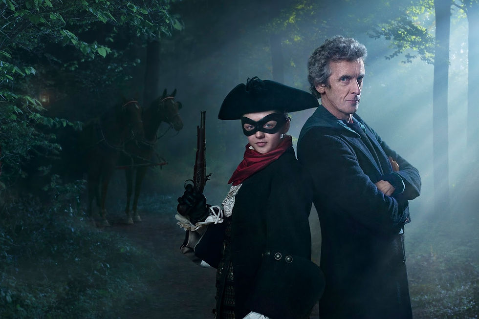 Ahildr with mask and gun posing back to back with the Doctor who has his arms crossed. A horse is behind them and they are in a wooded area