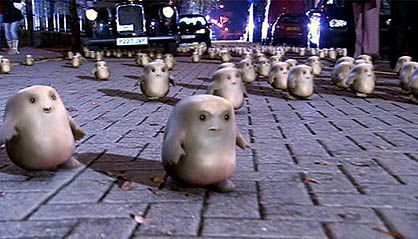 Adipose, little ball things of white fat with eyes and mouth waddling along a street