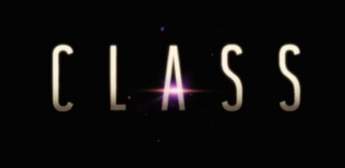 Class logo, white and gold writing on black background. Light shining behind the A