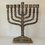 Thumbnail: Large Brass Hanukkah Menorah with 12 Signs of Israel's Tribes - Majestic Cente