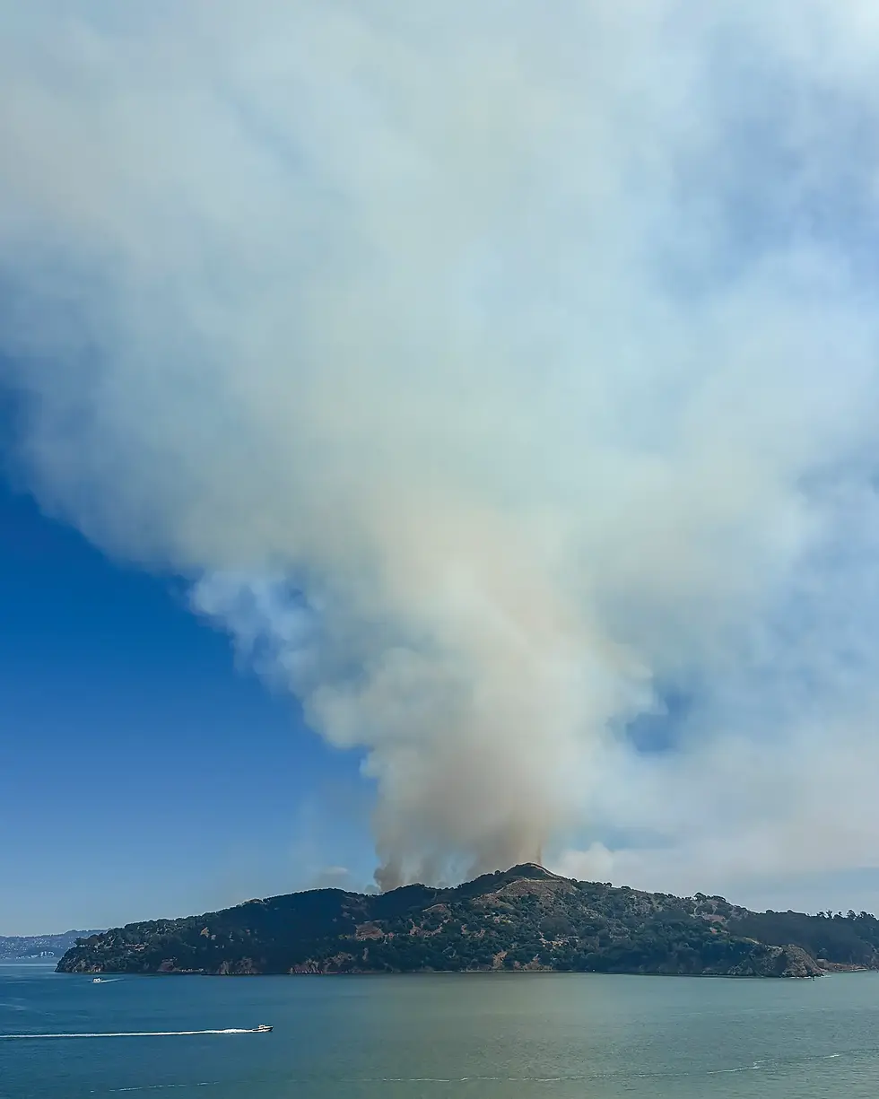 Smoke from a prescribed burn rises off Angel Island at about 1:30 p.m. Sept. 8. Crews are burning up to 260 acres at the state park through the week to reduce wildfire fuel. (Claire McAuliffe)