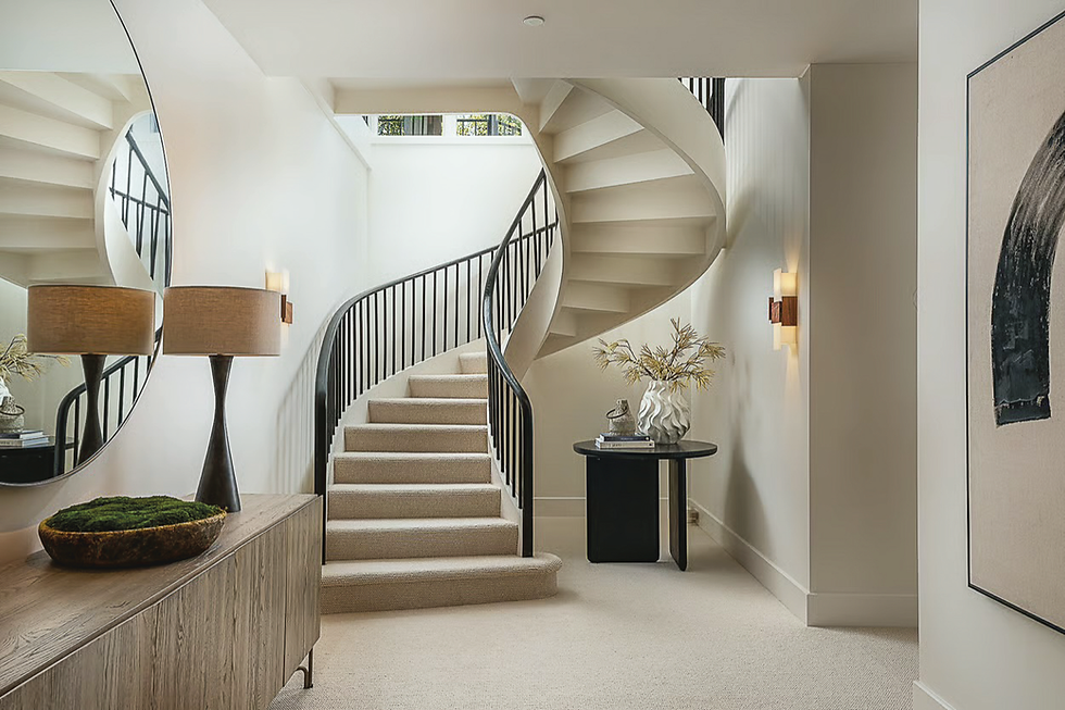 The curving staircase is among the signature architectural features of the eight-bedroom modernist estate on Crest Road atop Belvedere Island. (Jeffrey Frisk / www.jfrisk.com)