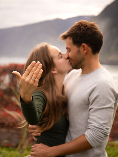 Couple kissing with engagement ring during a romantic proposal photoshoot in Madeira