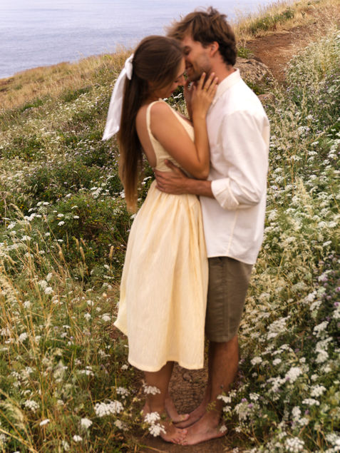 Couple embracing during a romantic honeymoon photoshoot at Ponta de São Lourenço, Madeira