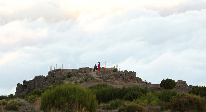 Couple above the clouds during a mountain proposal experience at Pico do Arieiro in Madeira