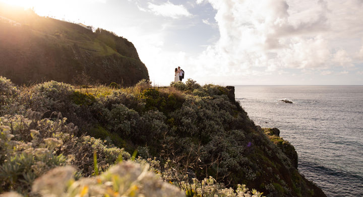 Couple photographer in Madeira documenting intimate moments above the Atlantic Ocean