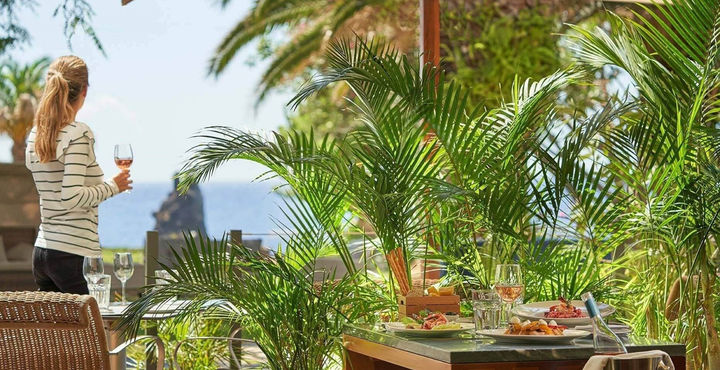 Luxury romantic dinner setup with flowers and candles Madeira