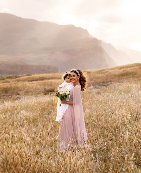 Mother and baby family photoshoot in Madeira surrounded by beautiful golden landscapes and soft light