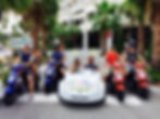 picture of happy clients that rented scooters and Scoot Coupe to ride at clearwater beach from Beach Scooter & Bike Rentals bikes from 