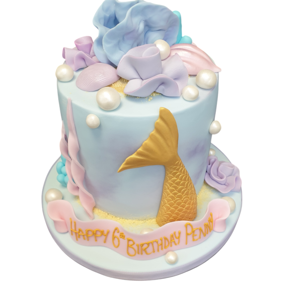 A mesmerizing mermaid-themed cake with underwater elements, perfect for an enchanting celebration.